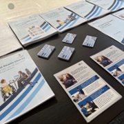 Documents about the Annual Health Check are placed on a table.