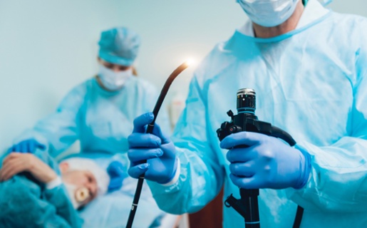 Image of surgeons readying internal camera equipment