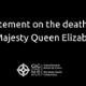 Black banner for respect of the Queens death with white writing.