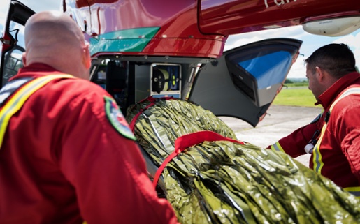 A picture of medics with a patient