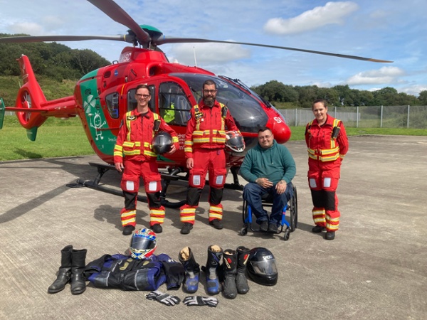 Helicopter crew with motorcycle donor 