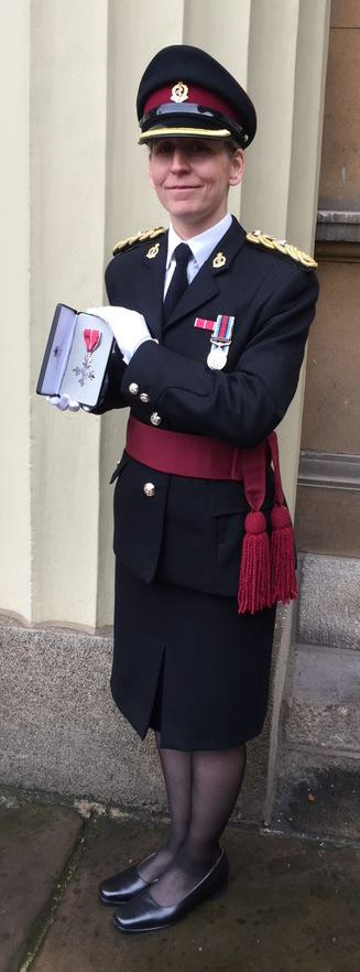 Dr Ami Jones with her MBE