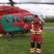 Dr Stuart Gill in front of a WAA helicopter
